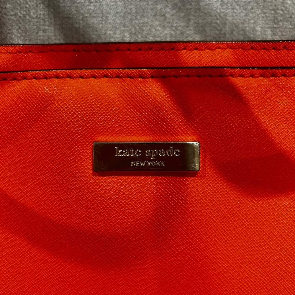 Kate Spade Vibrant Orange Handbag with Striped interior